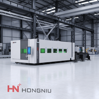 Table d'échange hydraulique robuste HN-6025GA entièrement fermée pour découpe laser CNC à fibre grand format avec dispositif de serrage hydraulique