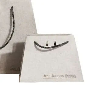 Wholesale custom trapezoidal design gray board skin care gift packaging shopping paper bag