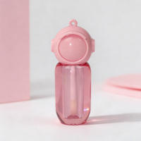 Mini contenants roses personnalisés avec logo du fabricant, tubes à gloss à lèvres vides en forme de robot mignon
