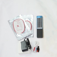 Défibrillateur analogique externe automatisé DARHMMY AED pour la machine d'enseignement des compétences de premiers secours de formation des sciences médicales et des infirmières