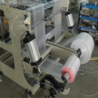 Machine automatique de fabrication de sacs en plastique noirs de type T-shirt et de sacs poubelles pour matériaux en polyéthylène et en nylon