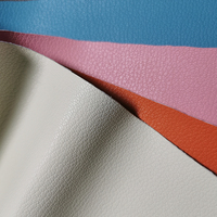 Tissu en cuir PU gaufré litchi couleur unie pastel clair avec support tissé résistant à l'abrasion pour sièges de voiture, canapés et sacs - 0,7-0,8 mm