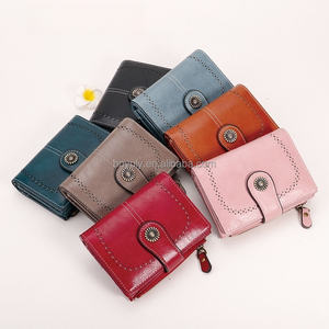 2026 Neue Großhandels-Kompaktbrieftasche für Damen aus Leder mit RFID-Schutz und Reißverschluss-Münzfach - Product Image 1