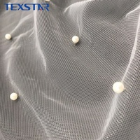 Tissu en tulle perlé tricoté 100 % polyester doux et antistatique, orné de perles, pour vêtements de luxe et voiles de mariée
