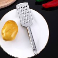 Handmatige roestvrijstalen multifunctionele groenteschiller, -snijder en -mes voor aardappelen, uien, radijzen, komkommers, keukengereedschap