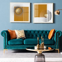 Canapé sectionnel Chesterfield en velours bleu avec pieds dorés et boutons