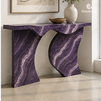 Table console contemporaine sur mesure en marbre de jade violet, modèle Wave Gate, pour projets hôteliers, villas et salons.