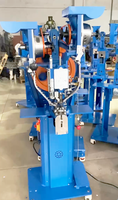 Machine à œillets à double tête Machine à poinçonner automatiquement les boutons de fixation de haute qualité