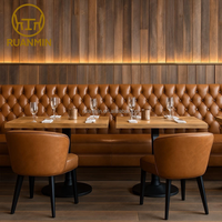 Ensemble de canapés en forme de U de luxe moderne avec revêtement en cuir PU et tables rondes en marbre pour restaurants, hôtels et salles de banquet