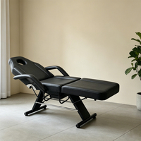 Fauteuil de massage et de beauté luxueux noir et blanc à jambes réglables, pliable, pour tatouage, coiffure, thérapie faciale et extensions de cils, économique