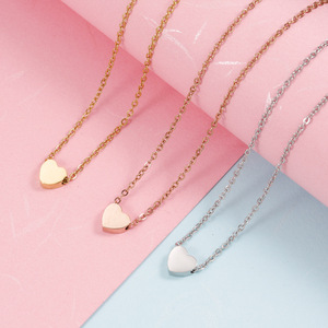Collana classica con pendente a cuore di pesca traforato in acciaio inossidabile per matrimoni e feste - Product Image 1