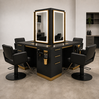 Mobiliario de Lujo para Salón de Belleza, Diseño Personalizado, Estaciones de Estilismo en Negro y Dorado, Superficies con Aspecto de Piedra y Espejos LED
