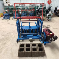 Machine mobile de fabrication de blocs de béton à prix d'usine en gros, avec moteur et pression hydraulique, facile à utiliser pour les espaces restreints
