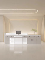Comptoir d'accueil en forme de L blanc crème avec LED, comptoir d'accueil minimaliste pour salon, clinique médicale, comptoir de caisse d'angle avec bande lumineuse