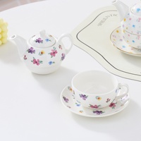 Théière en céramique peinte à l'or, résistante à la chaleur, style minimaliste, théière mère-enfant, petite tasse à café florale, soucoupe, cadeau
