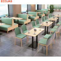 Ensemble de banquettes de restaurant Pastel avec bancs rembourrés verts, chaises assorties et tables carrées