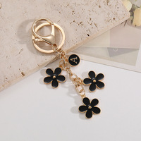   Porte-clés fleur artisanal 26 lettres, best-seller, mignon et tendance pour filles et étudiants, pendentif de sac et anneau porte-clés