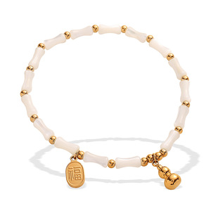 สร้อยข้อมือเหล็กไทเทเนียมประดับเปลือกหอยสีขาว เปลือกหอยธรรมชาติ สีทอง ของขวัญเครื่องประดับสำหรับทุกเพศ - Product Image 5