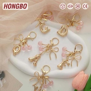 Portefeuille en cuir mignon populaire d'inspiration européenne et américaine avec motif lettres bulles, cerise et nœud pour sacs - Product Image 1