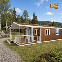 Maison conteneur moderne de luxe 20 pieds, structure blanche, grain de bois, extensible, avec véranda à double aile, terrasse, suite d'hôtes pour jardin, hôtel/villa