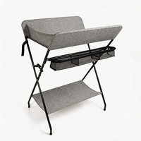 Table à langer pour bébé avec structure triangulaire stable, tapis imperméable en polyester 600D haute densité et filet amovible