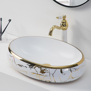 Hotel luxury golden oval vanity vessel sink bowl white and riche gold plated hand wash ceramic basin for bathroom