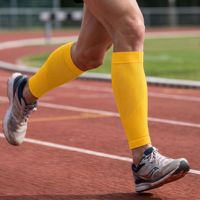 Chaussettes de compression personnalisées, manchons de compression sportifs jaunes respirants pour mollets, protège-tibias de football, entraînement, OEM, unisexe
