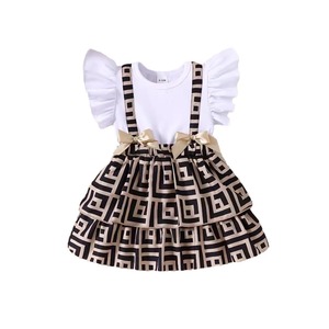 Venta caliente verano bebé falda algodón 0-2 años bebé niña cuello redondo manga con volantes lindo arco costura vestido