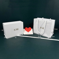 Boîte cadeau en ruban avec logo personnalisé emballage en papier écologique et recyclable avec feuille d'or imprimée pour la décoration de bijoux de mariage