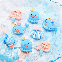 Accessoires de coque de téléphone de bonne qualité, style Océan Bleu, avec breloques en résine en forme de conque, pieuvre, sirène, coquillage et baleine