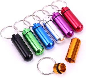 Wholesales Portable Miniature <b>Waterproof</b> Seal Metal Aluminum Pill Box Black Storage Container Metal Pill Cases with Keychain - Product Image 1