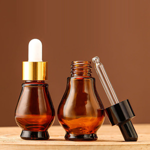 Flacone contagocce in <span class=keywords><strong>vetro</strong></span> marrone a forma <span class=keywords><strong>di</strong></span> zucca da 50ml 100ml per oli essenziali e prodotti per la cura dei capelli - Product Image 1