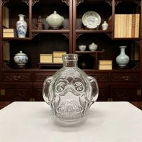 Bouteille de vin en verre sculpté personnalisable en usine avec bouchon en liège et emballage en carton pour bouteilles de spiritueux modernes de luxe