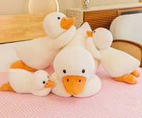 Vente en gros de la nouvelle grande oie blanche super douce oreiller en peluche jouet PP coton rempli de poupée de couchage