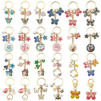 Belle fleur Sakura Designer porte-clés mignon papillon clé pendentif en Stock métal artisanat porte-clés pour les filles