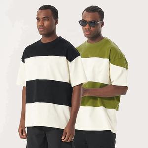 เสื้อยืดผ้าฝ้าย100% สำหรับผู้ชายทรงโอเวอร์ไซส์ลายทางลำลองถักลายทางมีโลโก้ด้านหน้า - Product Image 1