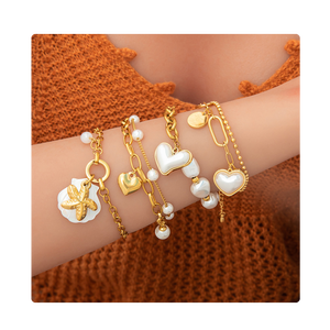 กำไลข้อมือสแตนเลสสตีล 18K PVD ชุบทอง ประดับมุกและเปลือกหอย ดีไซน์หลากหลาย พร้อมจี้รูปหัวใจและสัตว์ทะเล |   กันน้ำและป้องกันการแพ้ - Product Image 1
