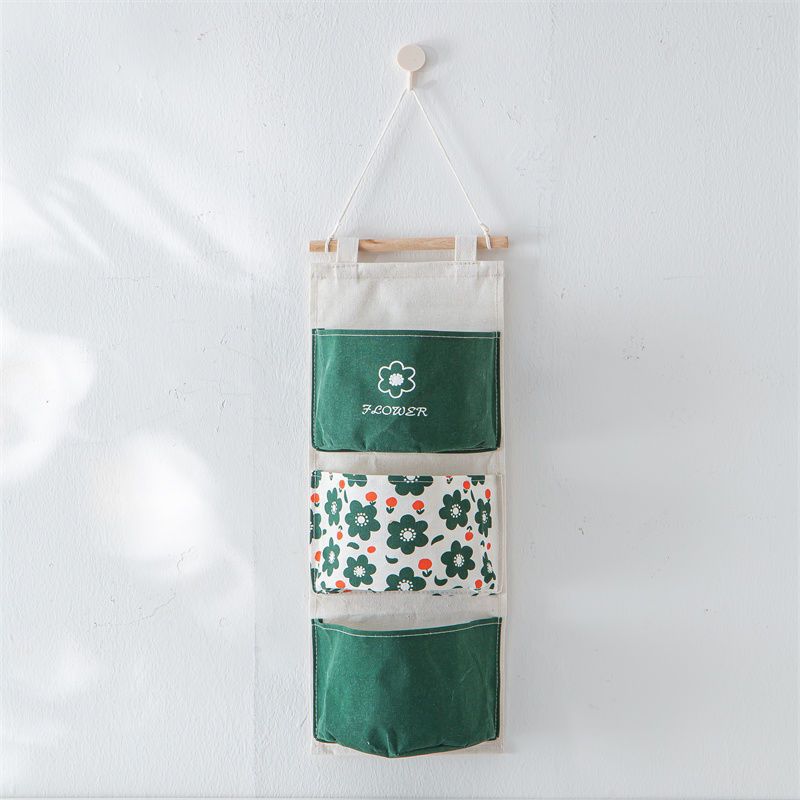 Bolsa colgante verde de tres bolsillos