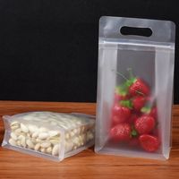Sac d'emballage alimentaire à fermeture éclair en plastique transparent et étanche à l'humidité avec fond plat et carré avec poignée Fournisseur d'usine