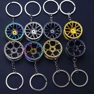 Llavero de coche con llanta de rueda de varios estilos al por mayor, llavero de metal duradero con forma de neumático para regalos de tiendas 4S - Product Image 4