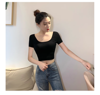 T-shirts d'été Slim Fit pour femmes hauts tricotés décontractés taille haute avec manches courtes à col rond exposées sexy caractéristique anti-boulochage