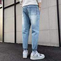 Vente en gros d'usine, nouveaux jeans skinny déchirés en denim de printemps pour hommes, coton/polyester, surplus de stock, liquidation