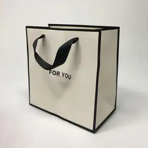 Wholesale Cheap Price Famous Brand Gift Custom Printed Shopping Paper Bag With Your Custom Logo Kraft Paper Bag Custom