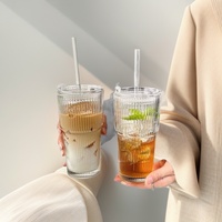 Bouteille d'eau en verre élégante et moderne, anti-fuite, grande capacité, avec couvercle et paille, pour jus et café, design minimaliste et esthétique.