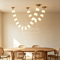 Luminaire suspendu linéaire en forme de boule d'albâtre naturel de luxe, cadre en laiton, pour salle à manger, villa, comptoir de bar, décoration