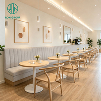 Juego de Muebles de Restaurante Modernos Personalizados Ron Group, Mesa Redonda de Madera, Silla de Madera Maciza, Asientos de Tela Gris en Forma de L