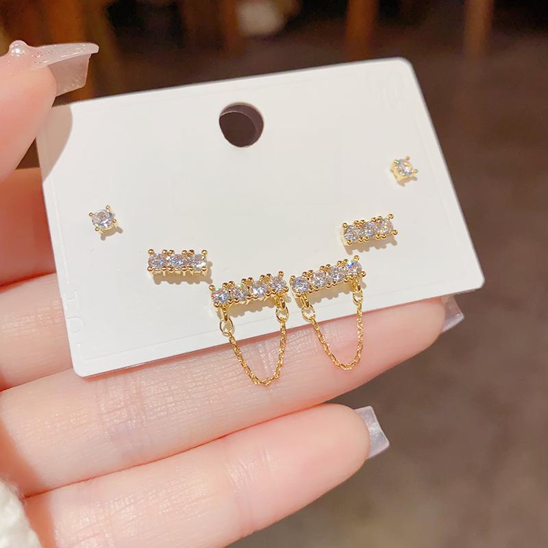 62# Combinaison de pompons en or et zircon