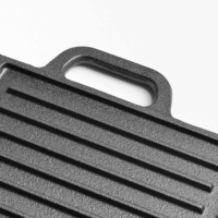 Plaque de cuisson en fonte rectangulaire double face universelle pré-assaisonnée