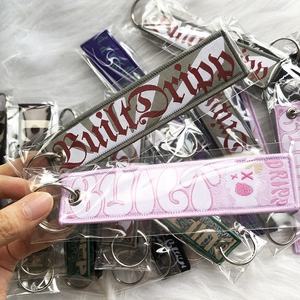 Personalizar logotipo personal tejido bordado llavero tela llavero etiqueta con diseño propio tejido bordado llaveros - Product Image 2