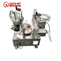 Machine de remplissage et de bouchage de bouteilles rondes semi-automatique de table pour la fabrication à petite échelle, peut être personnalisée, remplisseuse et bouchonneuse